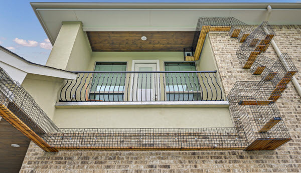 Habitat Haven Complex Wall Mounted Catio Tunnel and Stair System Leading From Home Upper Level to Lower Level Exterior